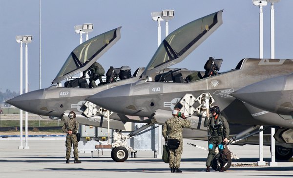 Photo Gallery: Family and U.S. Navy officials greet return of NAS Lemoore F-35 aviators to Lemoore from first sea deployment F-35 pilots salute the NAS Lemoore ground crew upon landing Saturday in Lemoore.
